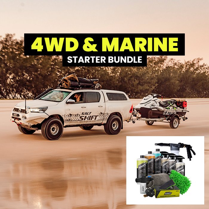 4WD and marine starter bundle with a truck towing a trailer on a beach.