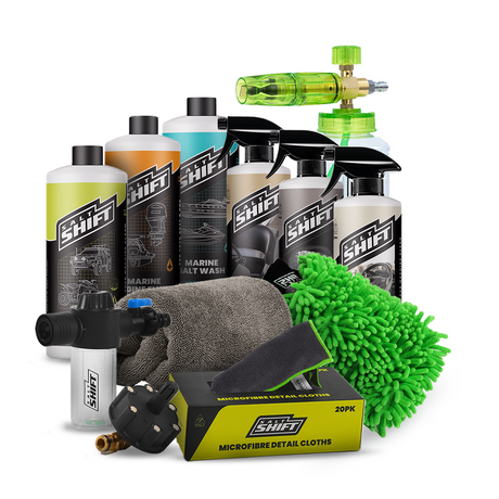 Collection of cleaning products including bottles, sprays, and cloths with 'Shift' branding on a white background.