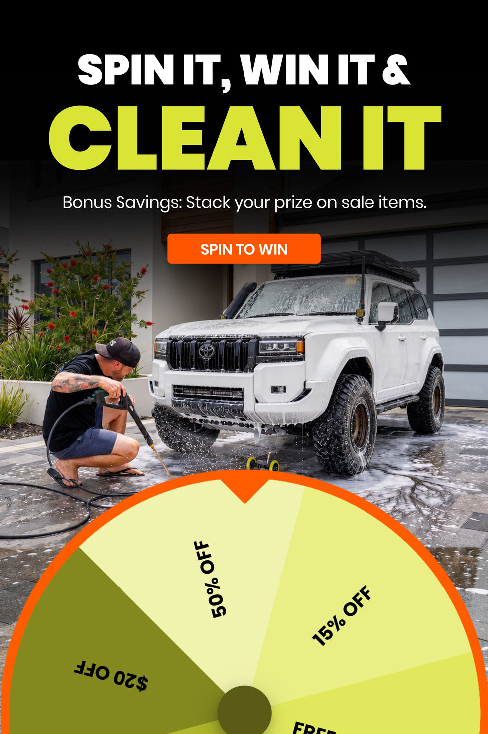Promotional graphic with the text 'SPIN IT, WIN IT & CLEAN IT' above a lifestyle photo of a man washing a white SUV in front of a garage. A large yellow-green discount wheel appears at the bottom with text including '50% OFF', '15% OFF', '$20 OFF', and 'FREE'.