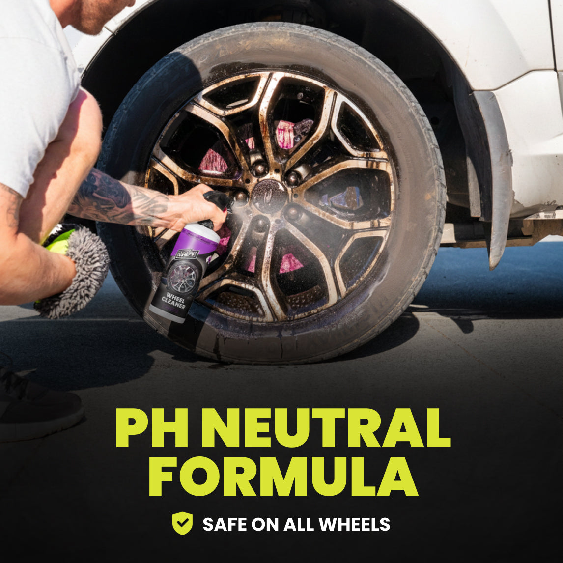 Person cleaning a car wheel with a spray bottle, text 'PH Neutral Formula Safe on All Wheels' displayed.