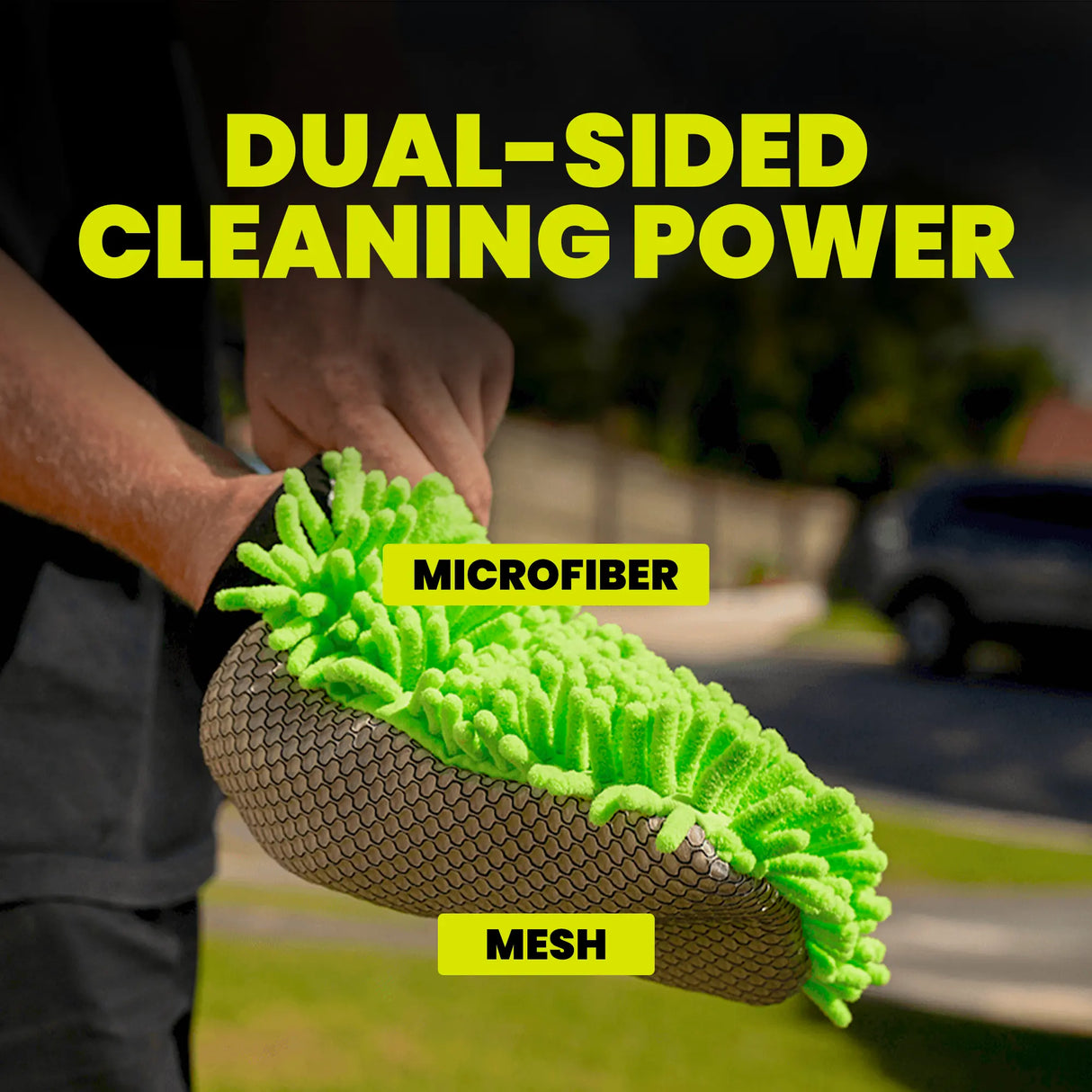 Cleaning tool with dual-sided design featuring microfiber and mesh, held by a person outdoors.