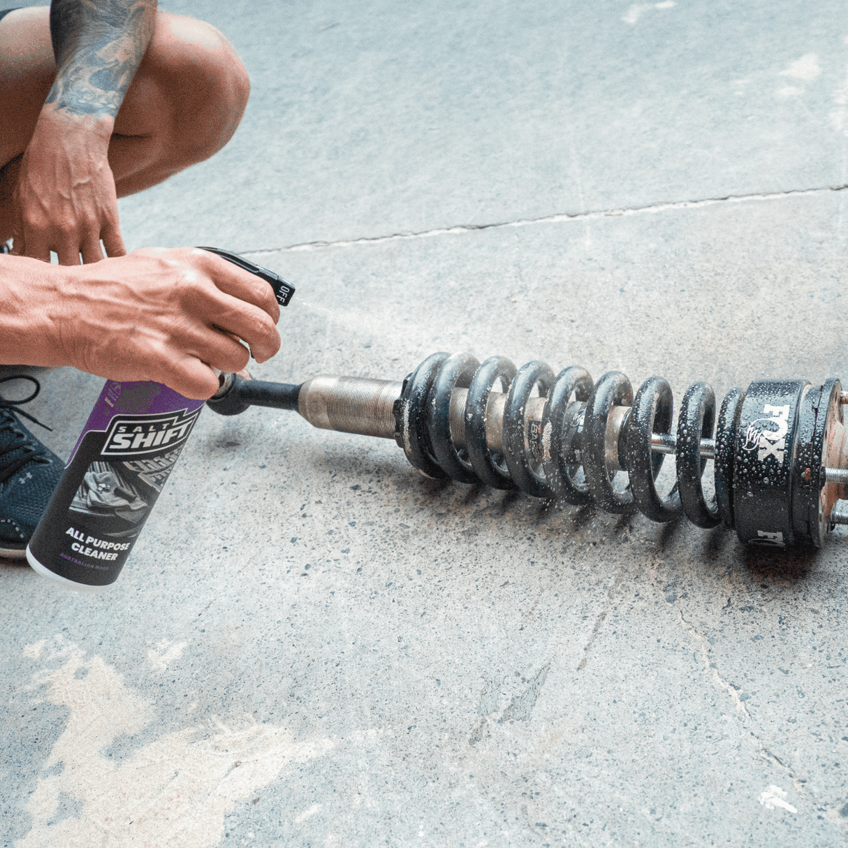 Men spraying salt shift all purpose cleaner