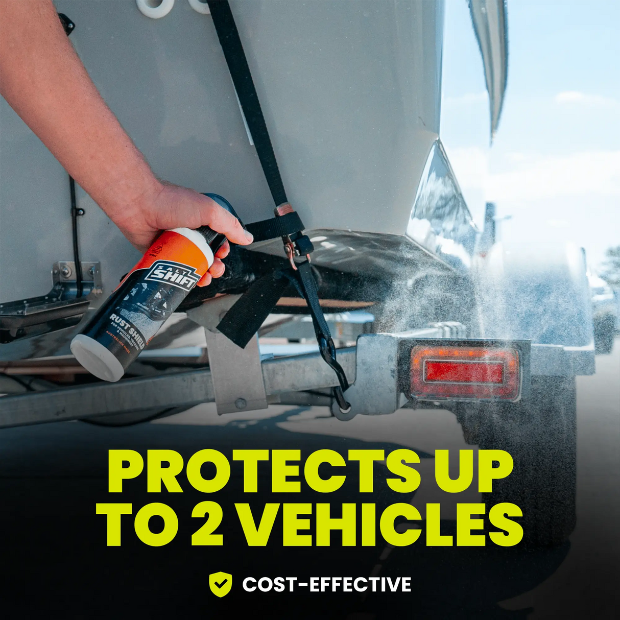 Person using a tool on a vehicle with text highlighting protection for up to two vehicles.