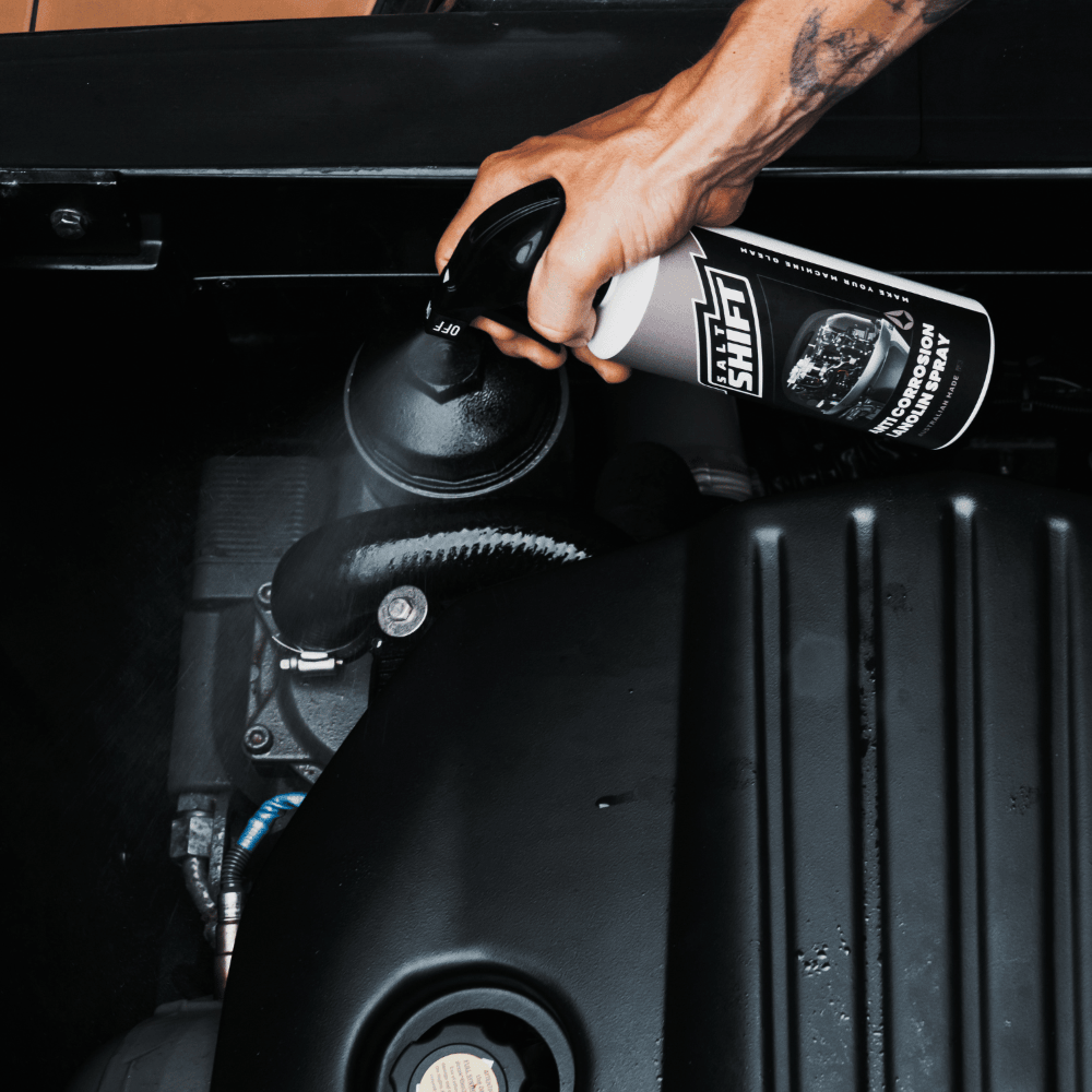 Using Salt Shift Anti-Corrosion Spray to protect engine parts from rust, moisture, and wear for long-lasting performance.