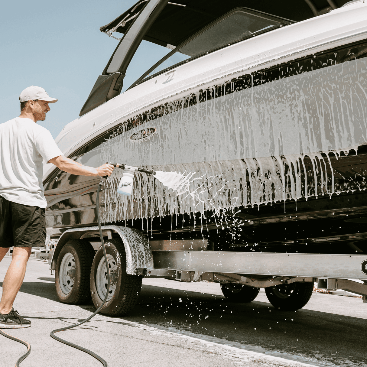 men cleaning boat with salt shift product