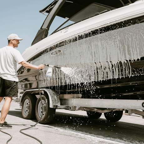 men cleaning boat with salt shift product
