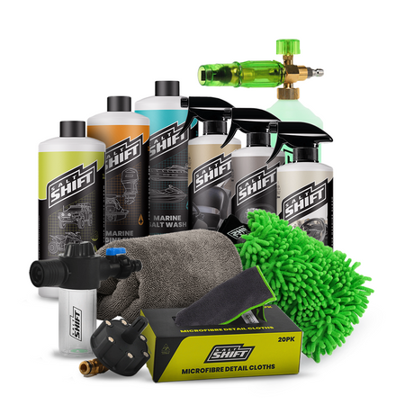 Collection of cleaning products including bottles, sprays, and cloths with 'Shift' branding on a white background.