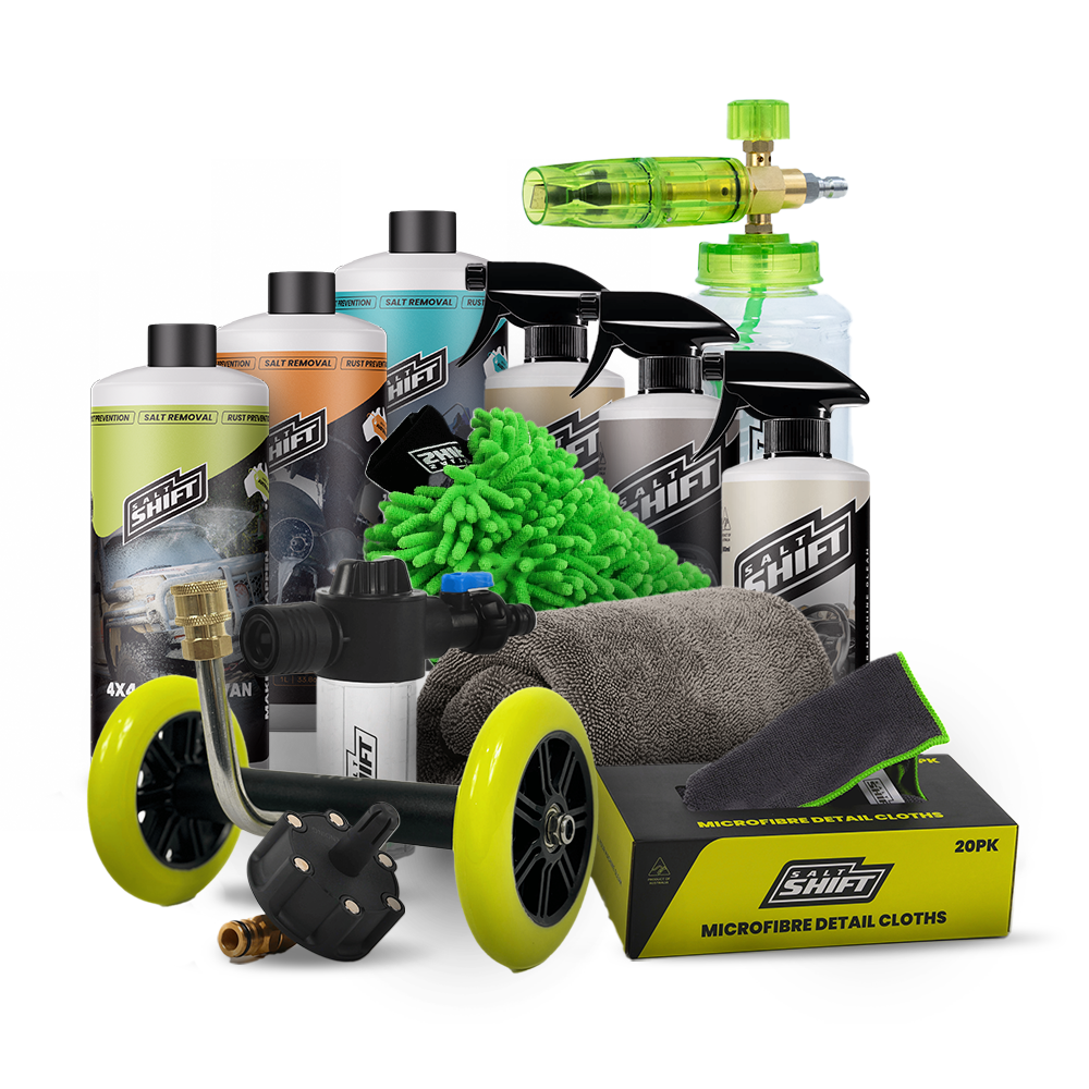 Automotive detailing products including bottles, a spray gun, and cloths on a white background.