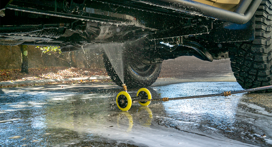 Car washing system with water sprays on a vehicle