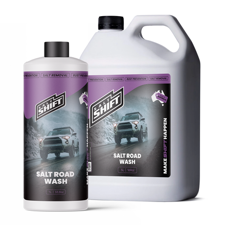 Two bottles of Shif't Salt Road Wash on a white background