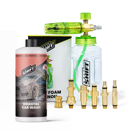 Car wash product set with bottles, nozzles, and packaging on a white background