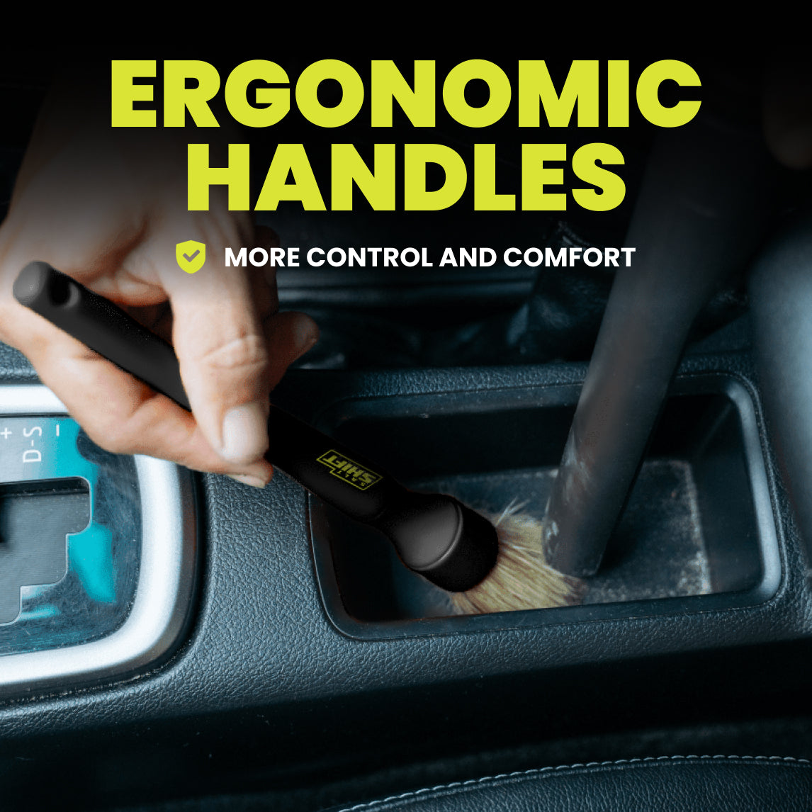 Hand using a brush with ergonomic handle in car interior, text 'Ergonomic Handles' and 'More control and comfort'.