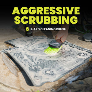 Hard cleaning brush being used on a car mat with text 'Aggressive Scrubbing' and 'Hard Cleaning Brush'.