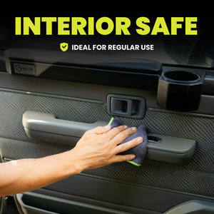 Hand cleaning car interior with text 'Interior Safe Ideal for Regular Use' on a black background
