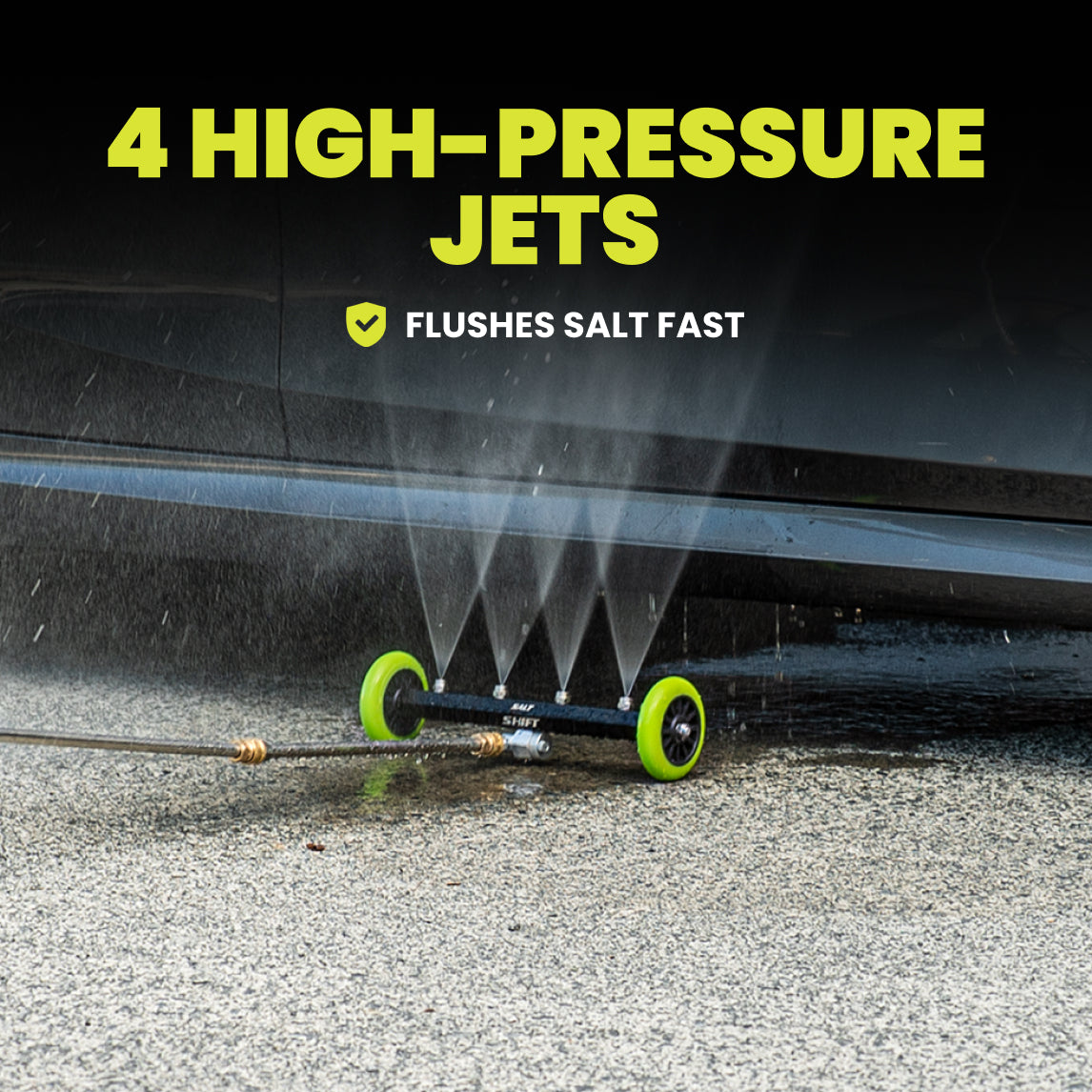 High-pressure underbody blaster with four jets flushing salt off a vehicle.