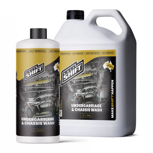 Two bottles of 'Shift' undercarriage and chassis wash on a white background
