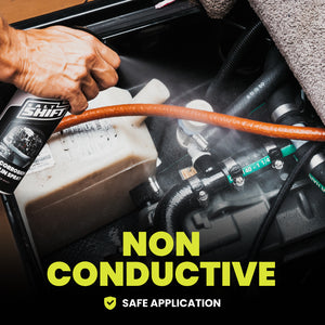 Person applying a non-conductive product to jet ski engine components with text indicating safe application.