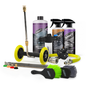 Automotive cleaning tools and products including a pressure washer, bottles, and brushes on a white background.