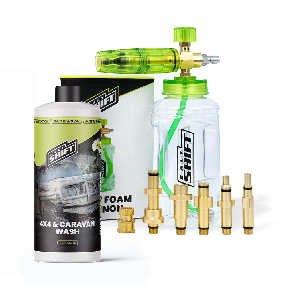 Car wash kit with bottles, nozzles, and packaging on a white background