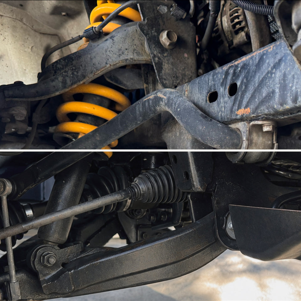 Close-up of a vehicle undercarriage showing black metal suspension components, a yellow coil spring, and a CV joint, with a horizontal dividing line across the center.