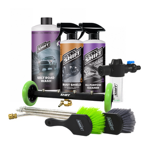 Car care product set with bottles, nozzles, and brushes on a white background
