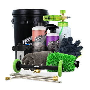 Car cleaning kit with a black bucket, bottles, mitts, and nozzles on a white background.