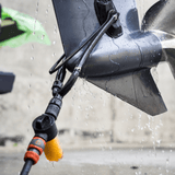 A Salt Shift engine flush system connected to a boat propeller for thorough cleaning.