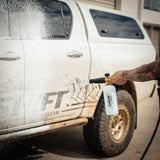 4x4 being covered in thick foam wash, breaking down dirt and grime for a deep clean.