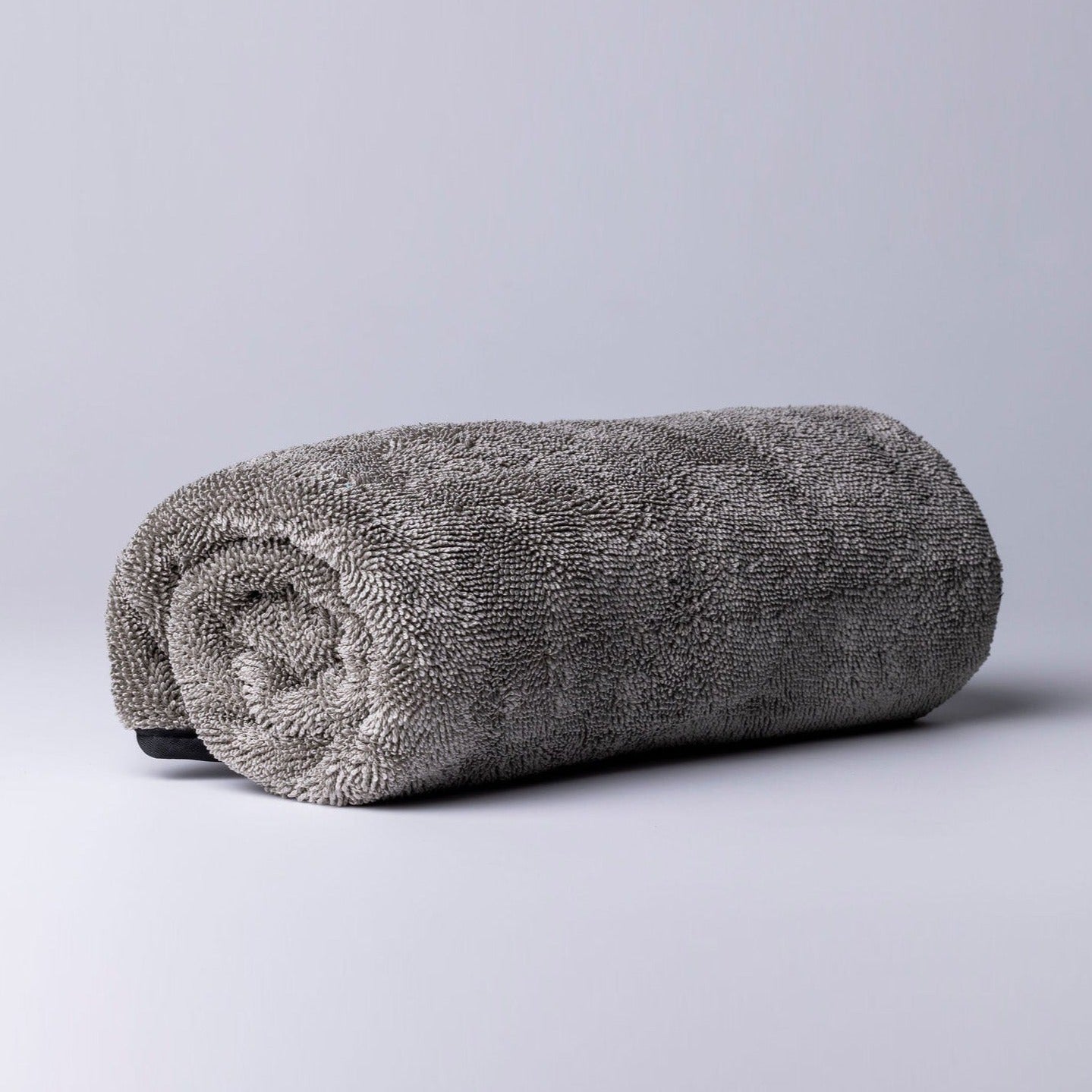 Photo of microfibre dry towel with grey background